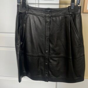 Vince snap button leather skirt.